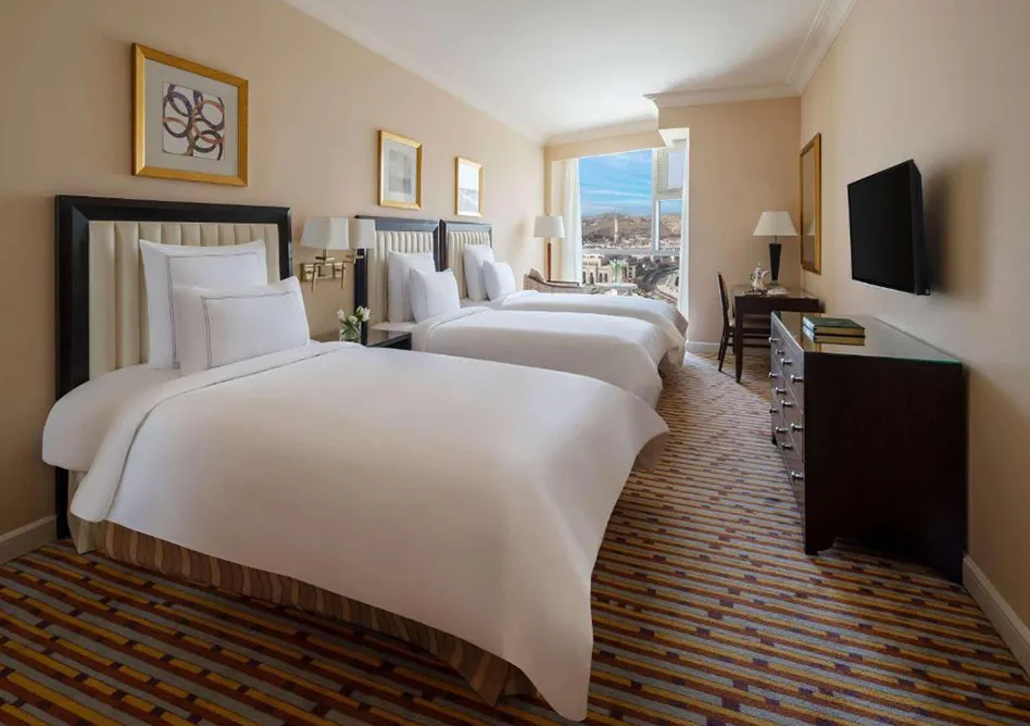 /media/hajj-images/3-single-bed-in-room%20%281%29.webp