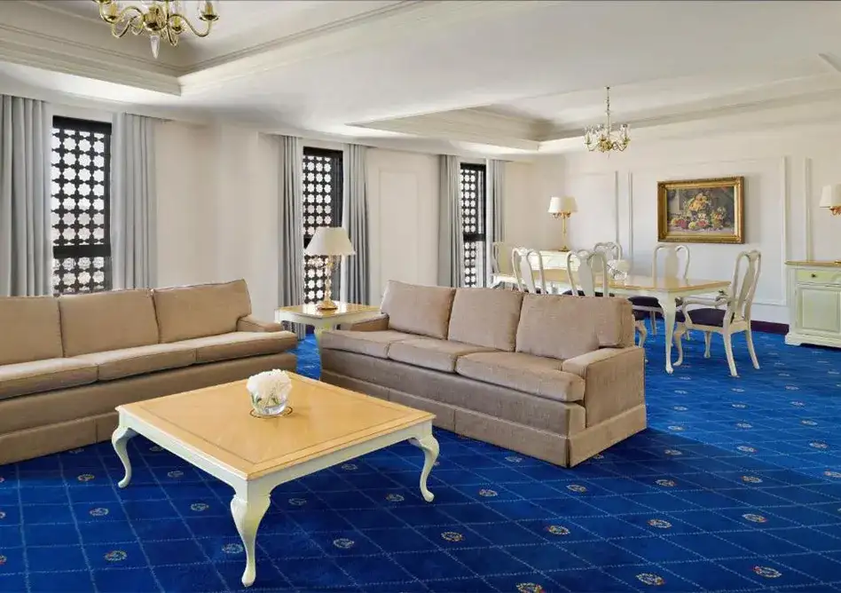/media/hajj-images/sitting-area-and-blue-carpet.webp