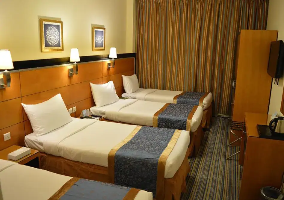 Room with 4 single beds