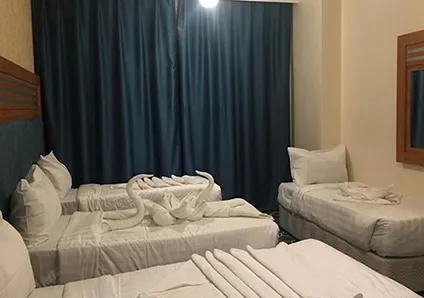 Room  with 3 single beds