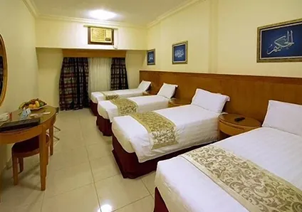 3 Double Beds in Dar Al Eiman Al Sud Hotel