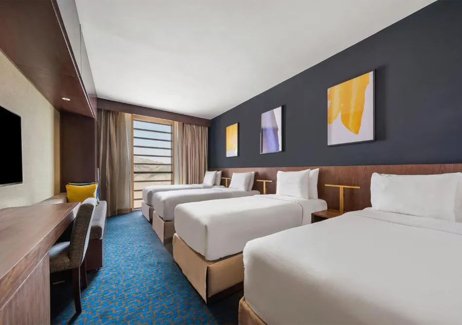 room with 4 single beds