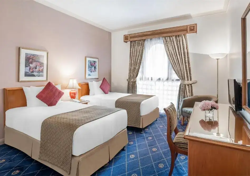 /media/umrah-images/2-single-beds%20%283%29.webp