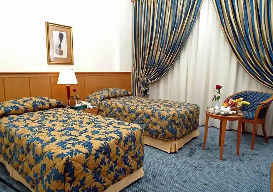 /media/umrah-images/2-single-beds.webp