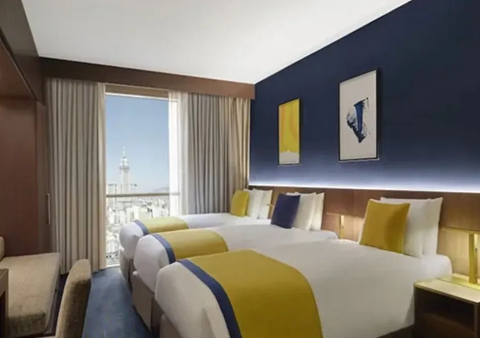 /media/umrah-images/3-single-beds-room%20%284%29.webp