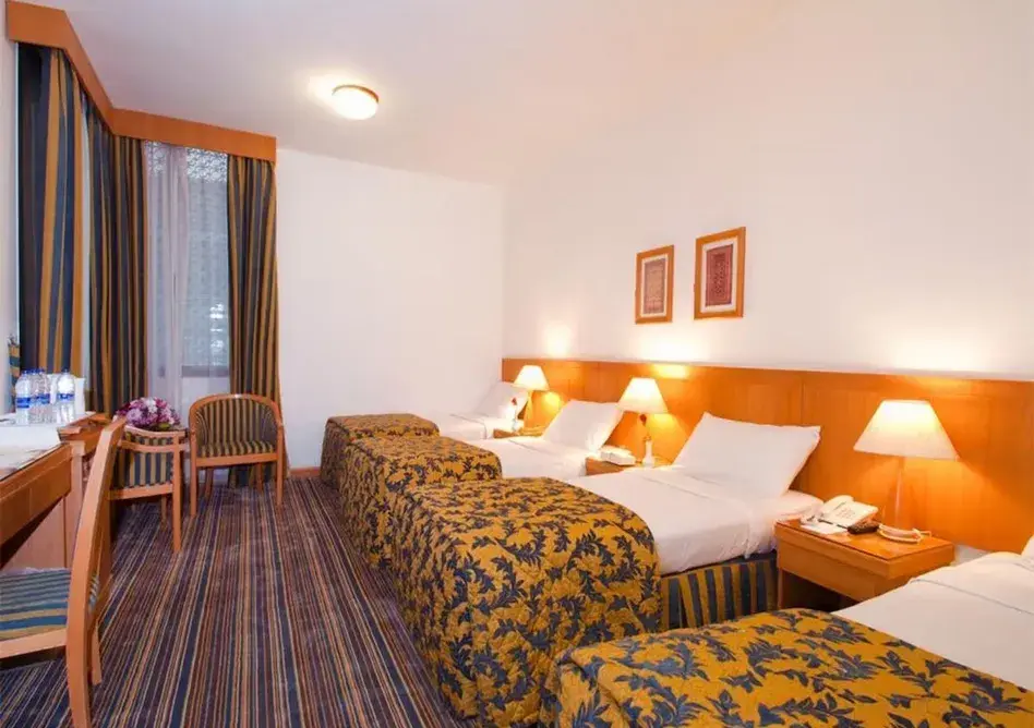 /media/umrah-images/4-single%20beds.webp