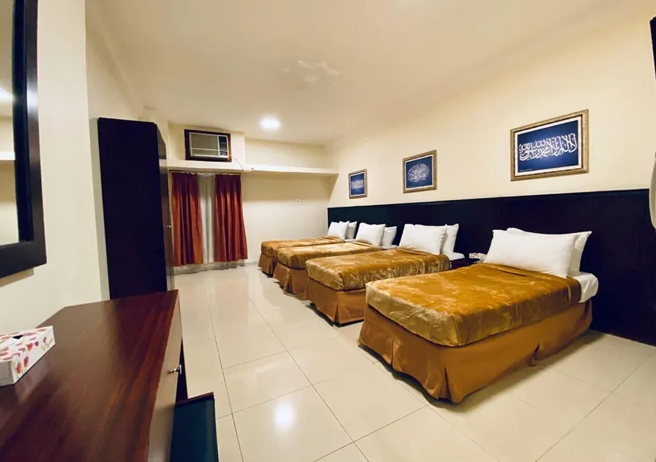 /media/umrah-images/4-single-beds%20%281%29.webp