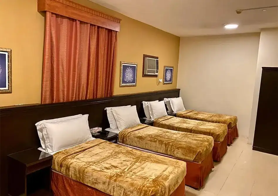 /media/umrah-images/4-single-beds%20%282%29.webp