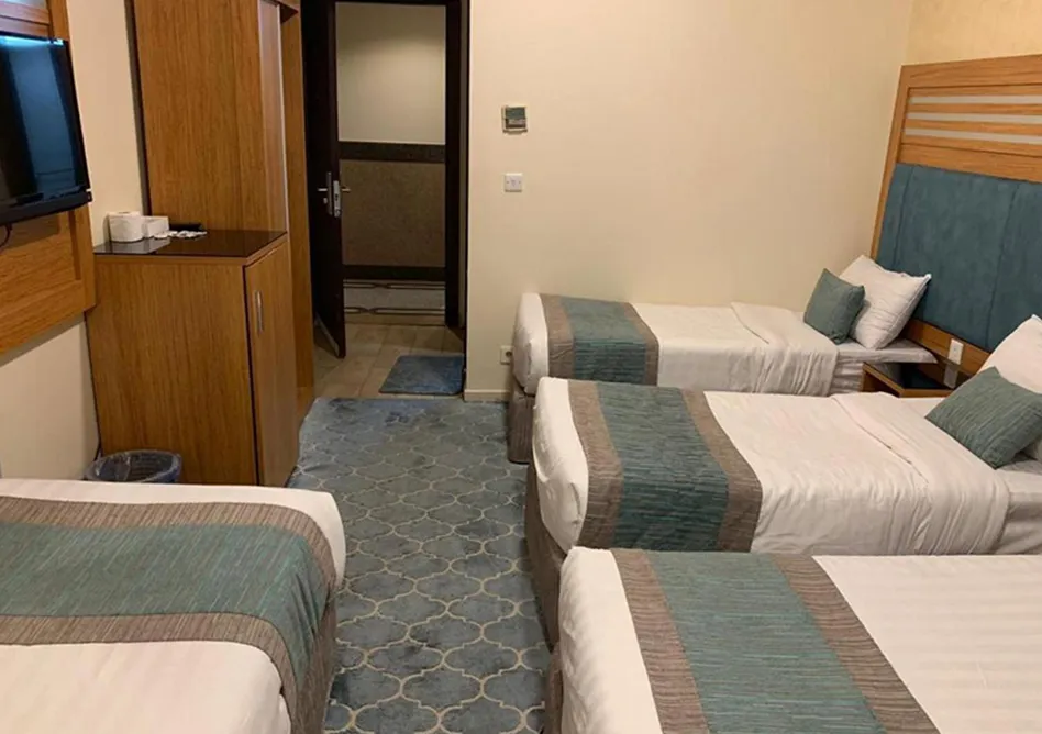 /media/umrah-images/four-single-bedsroom.webp