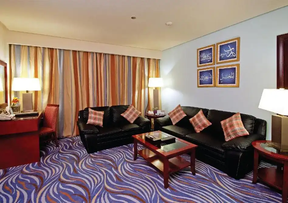 /media/umrah-images/room-sitting-area.webp