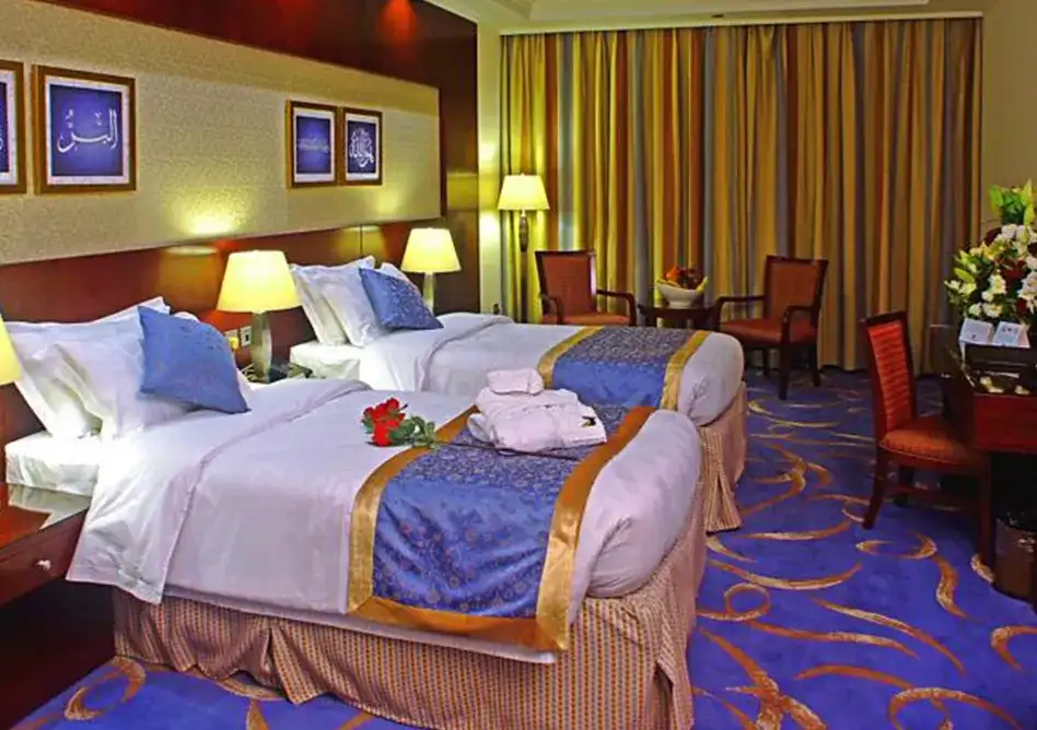 /media/umrah-images/room-with-2-single-beds%20%282%29.webp