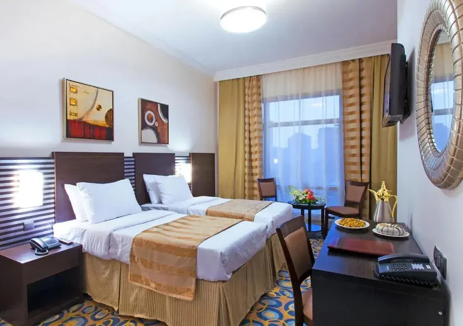 /media/umrah-images/room-with-2-single-beds-.webp